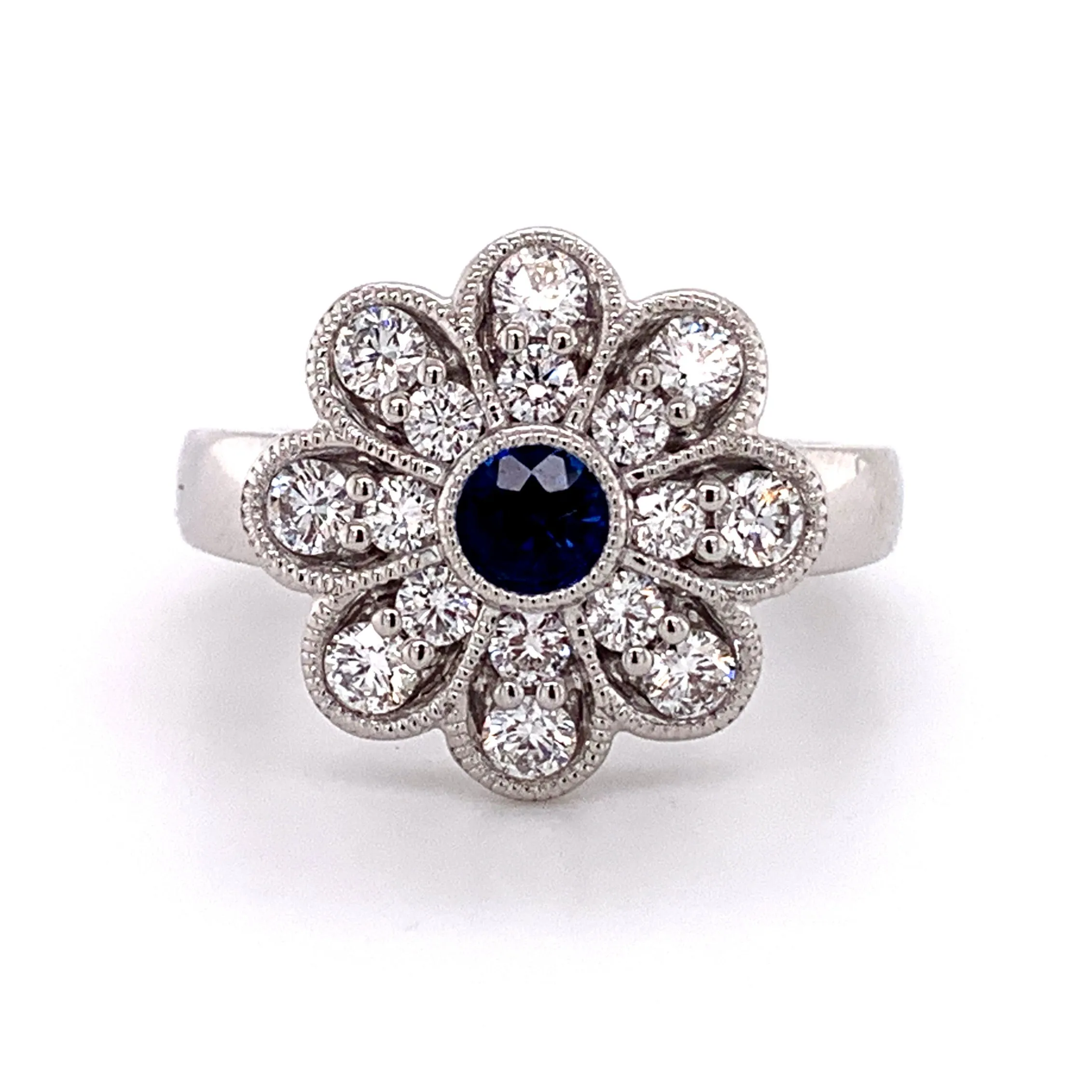 0.98CT TW SAPPHIRE AND DIAMOND ART-DECO STYLE FLOWER RING