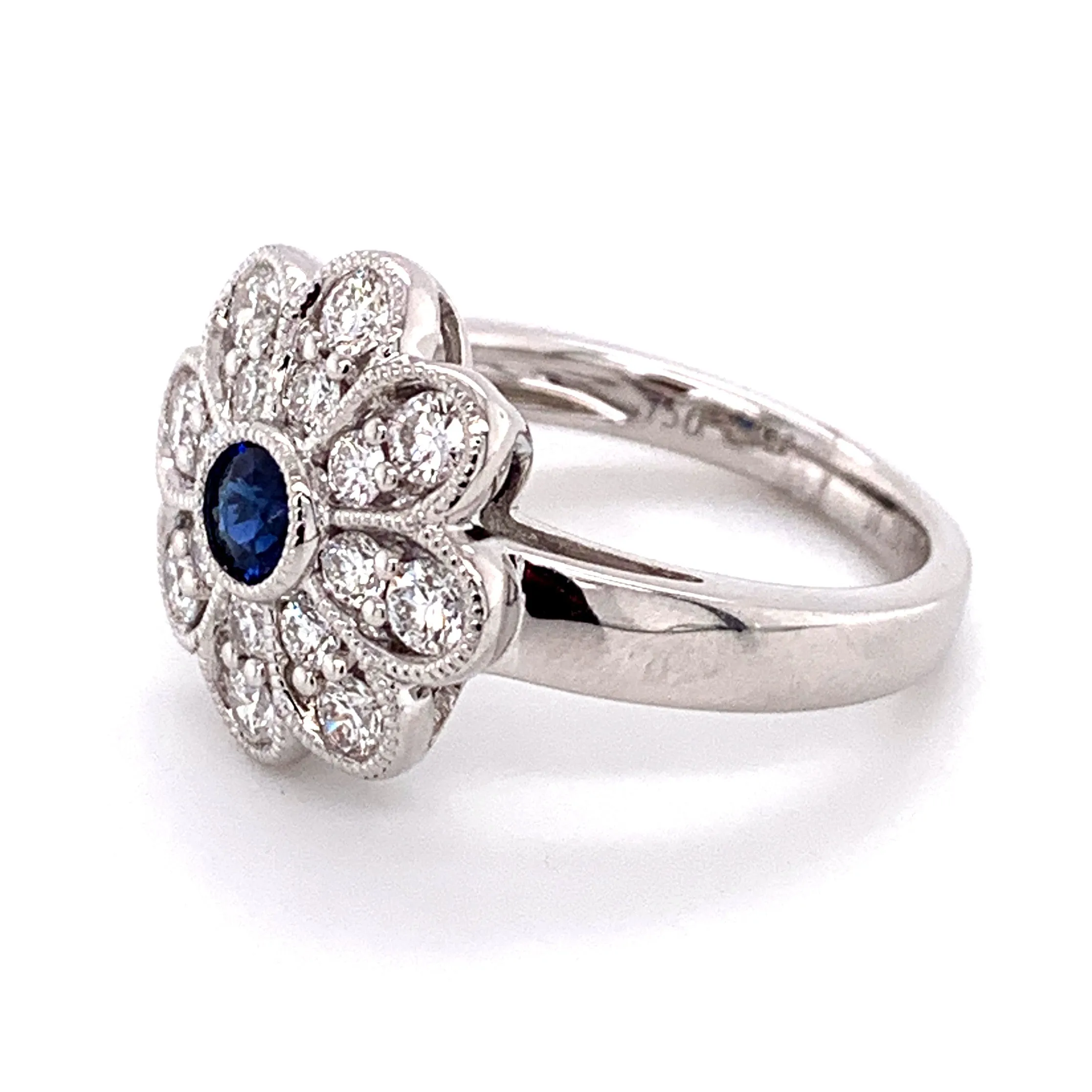 0.98CT TW SAPPHIRE AND DIAMOND ART-DECO STYLE FLOWER RING