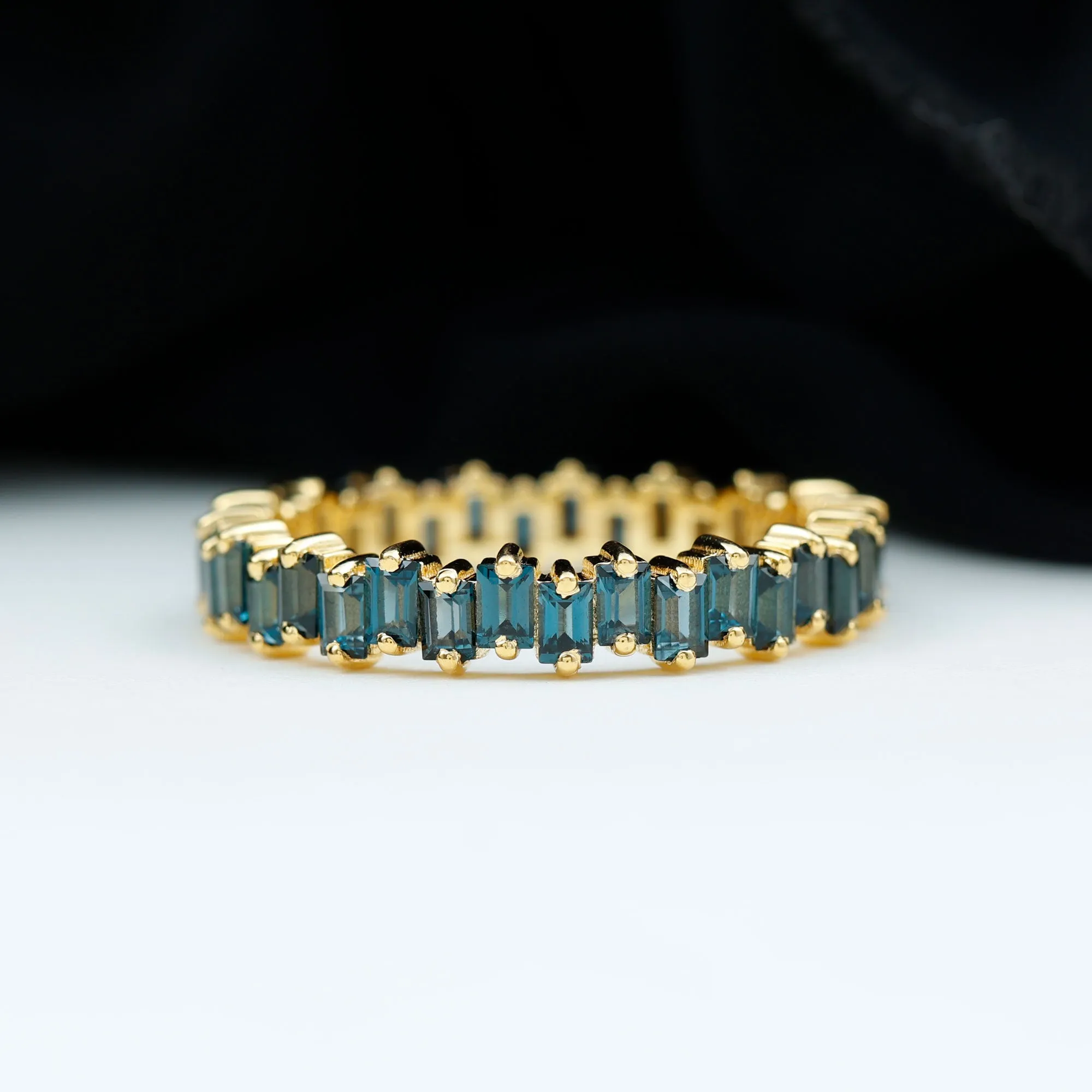 Baguette Cut London Blue Topaz Uneven Eternity Ring in 2 Prong Setting